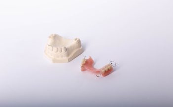 difference between dental bridges and dentures