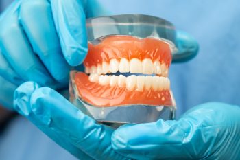 what is the cost of different types of dentures, and how long do dentures last