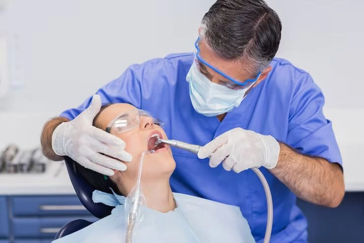 dentist-examining-patients-teeth