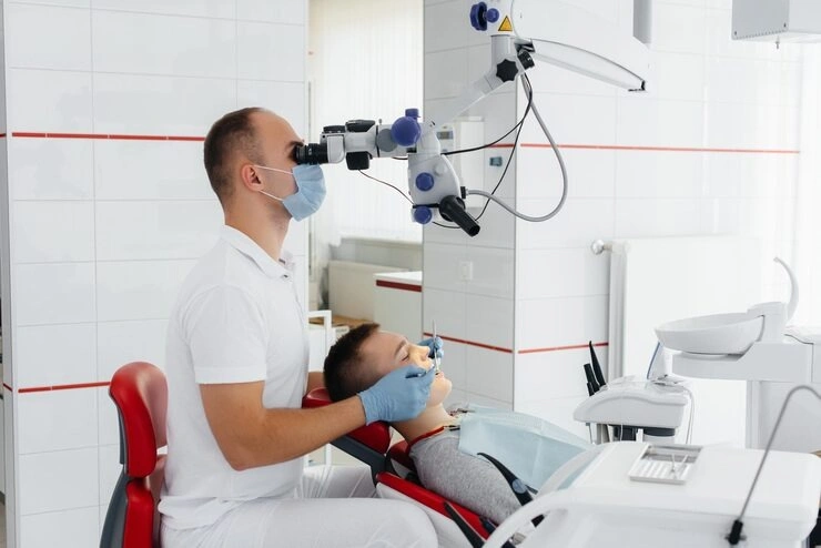 dentist-performing-dental-treatment