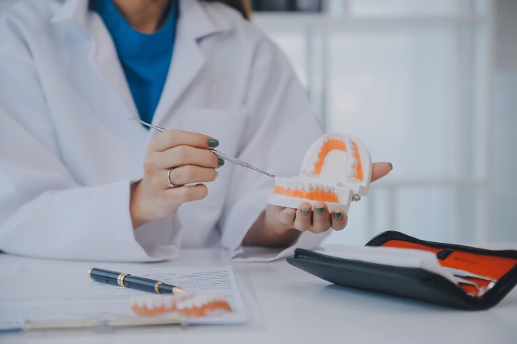 dentist explaining dental bridges